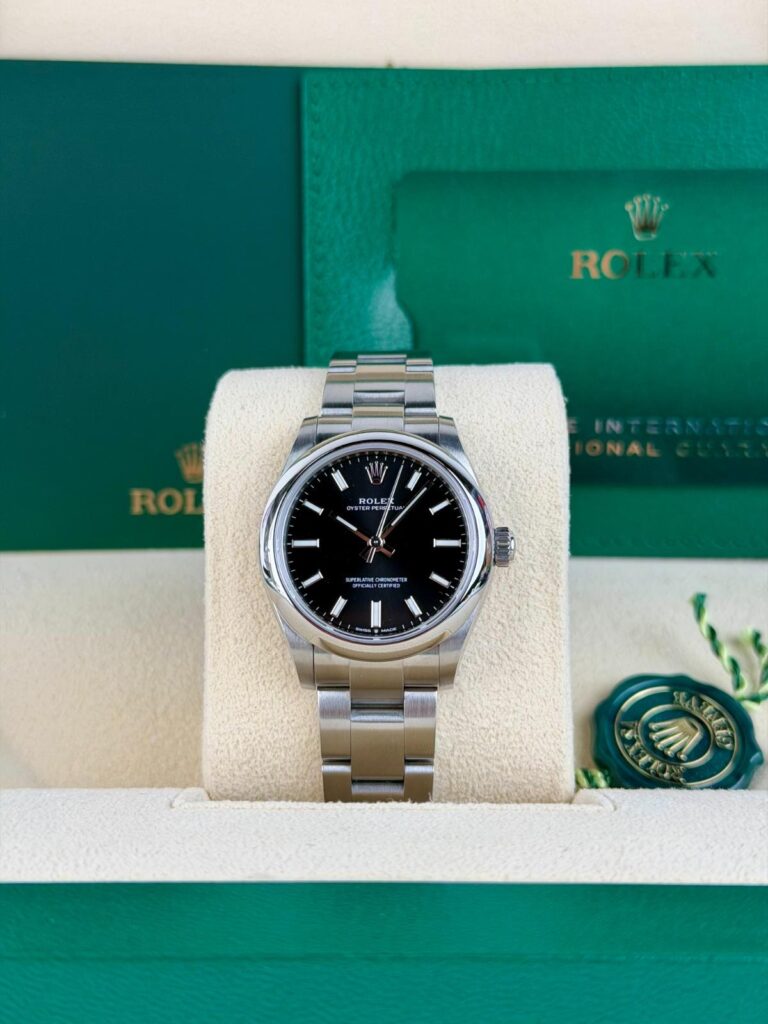 Rolex Oyster Perpetual 31mm 2023 Black Index Smoooth Oyster Preowned 277200