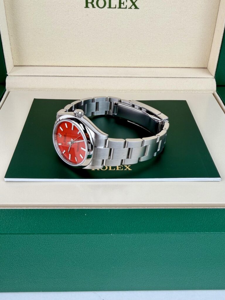 Rolex Oyster Perpetual 31mm 2021 Coral Red Index Smoooth Oyster 277200