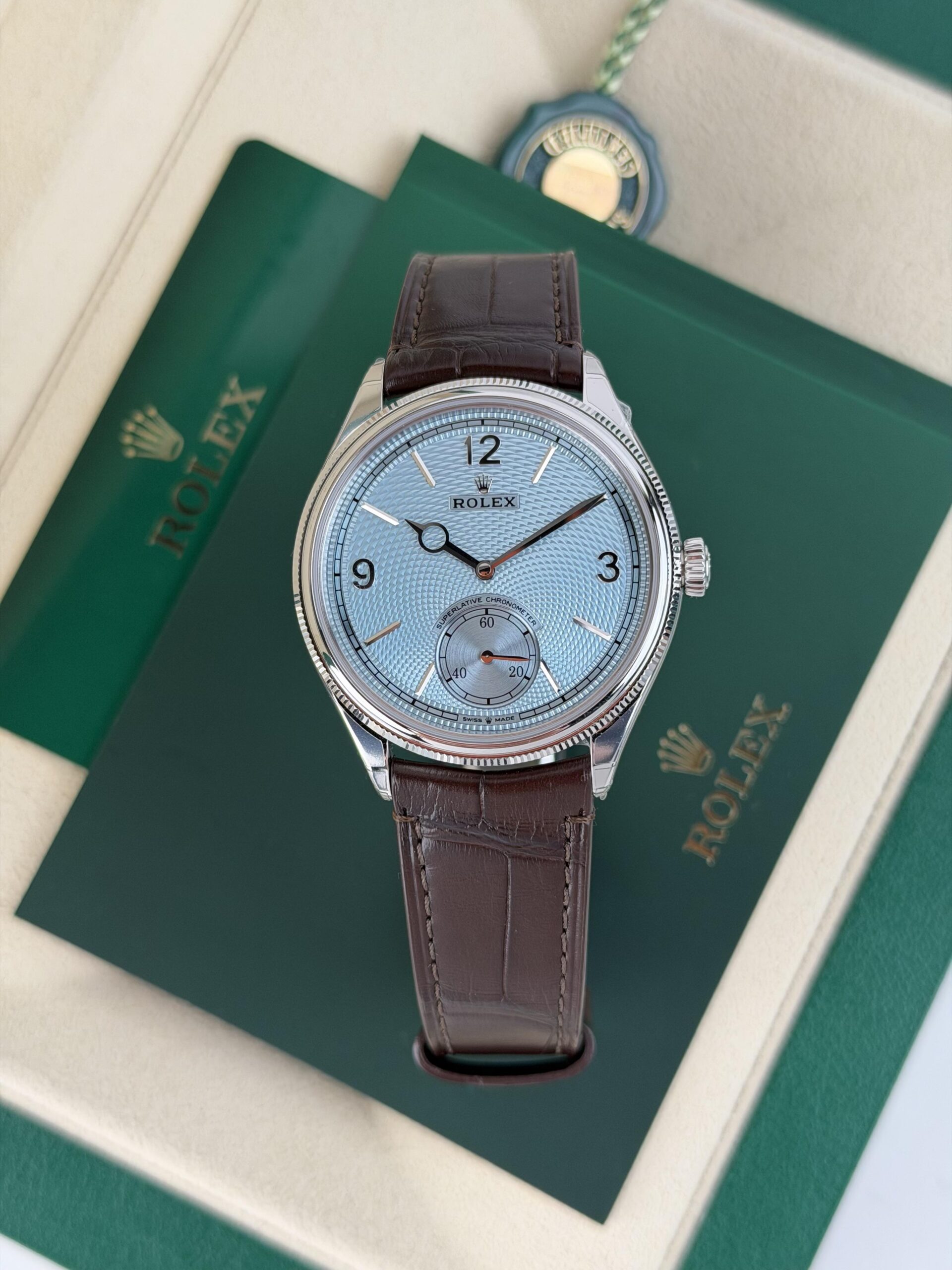 Rolex Platinum 1908 UNWORN 2026 Ice Blue Rice-Grain Motif Index Strap 52506