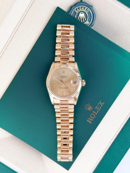 Rolex Datejust 31mm Champagne Index Fluted President 68278